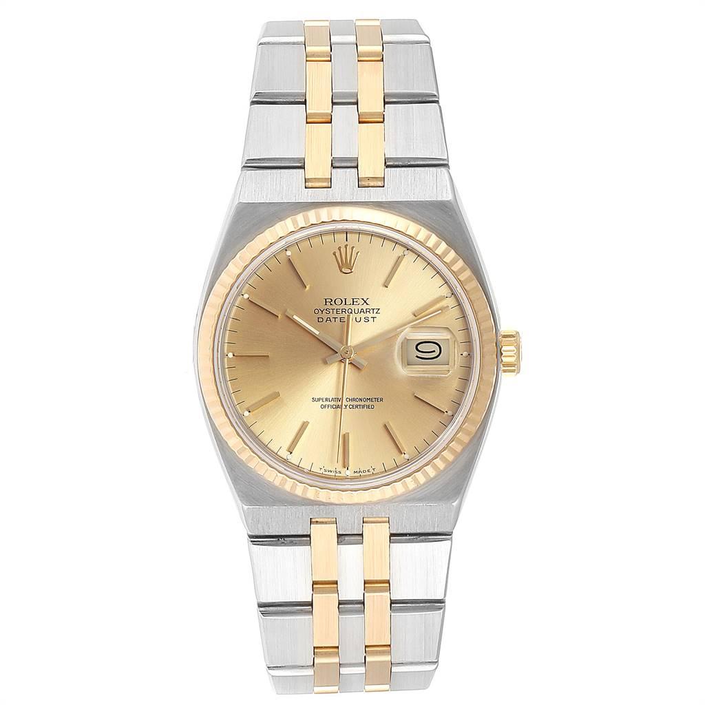 Rolex Oysterquartz Datejust 36mm Steel Yellow Gold Mens Watch 17013. Quartz movement. Stainless steel oyster case 36 mm in diameter. Rolex logo on a crown. 18k yellow gold fluted bezel. Scratch resistant sapphire crystal with cyclops magnifier.