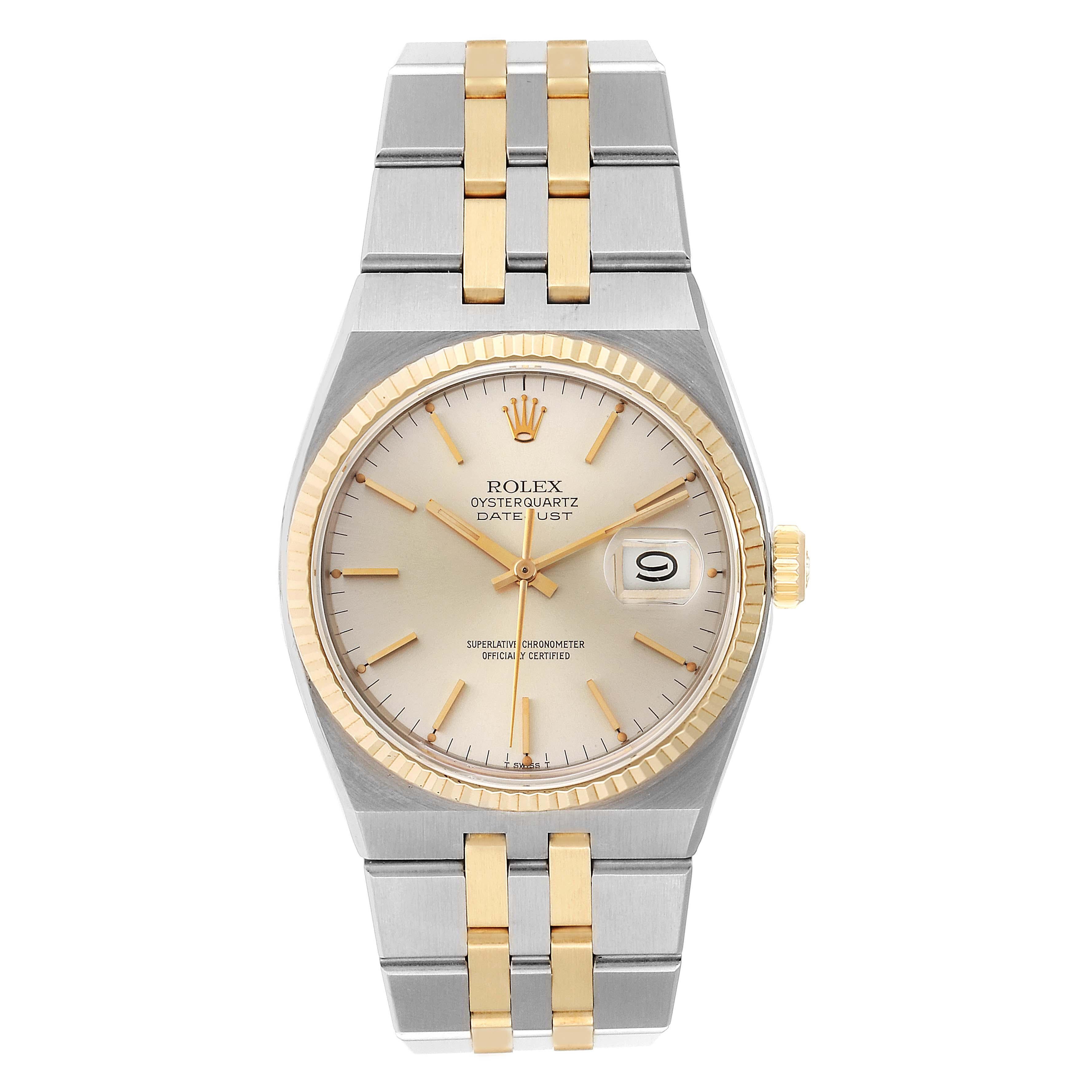Rolex Oysterquartz Datejust 36mm Steel Yellow Gold Mens Watch 17013. Quartz movement. Stainless steel oyster case 36 mm in diameter. Rolex logo on a crown. 18k yellow gold fluted bezel. Scratch resistant sapphire crystal with cyclops magnifier.