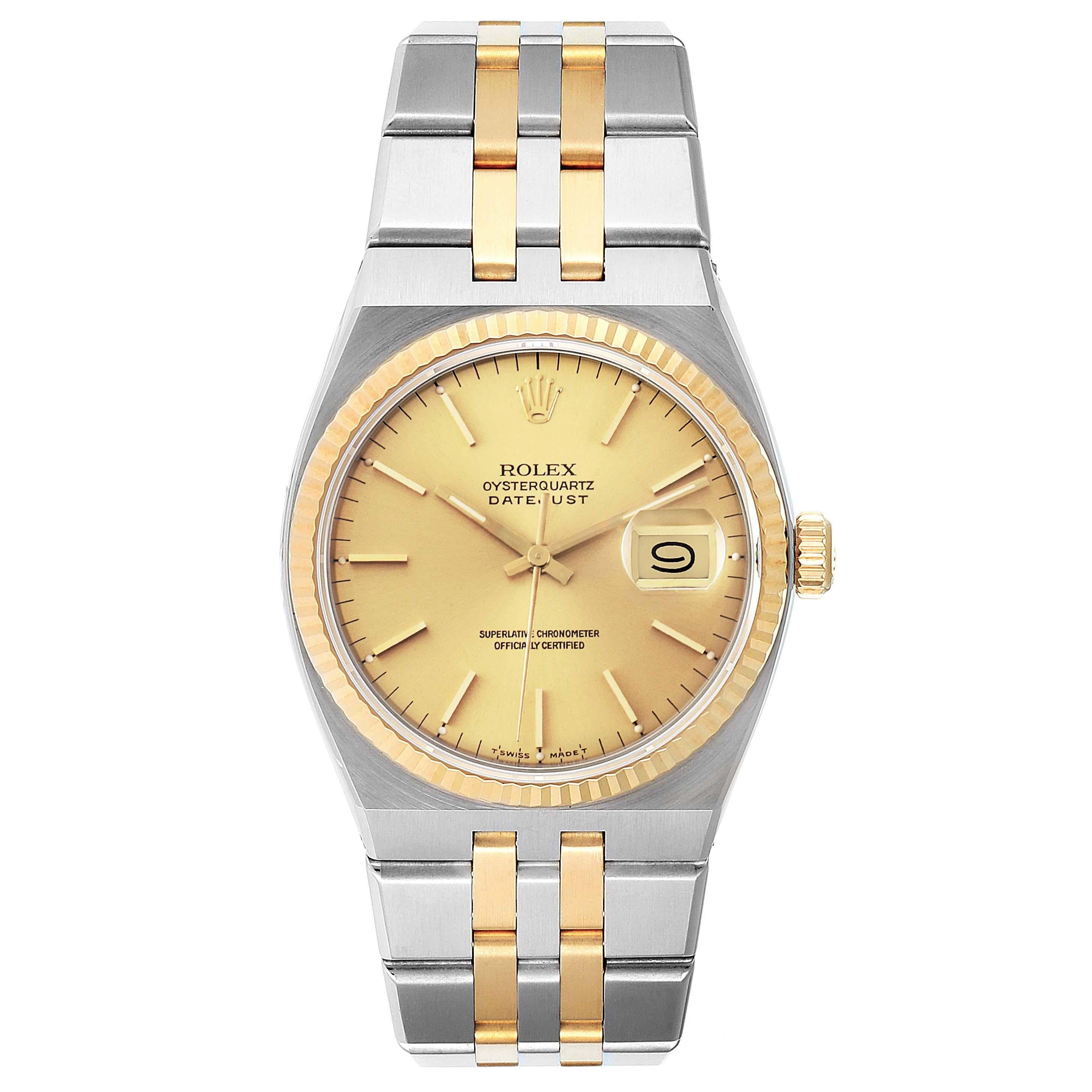 Rolex Oysterquartz Datejust 36mm Steel Yellow Gold Mens Watch 17013. Quartz movement. Stainless steel oyster case 36 mm in diameter. Rolex logo on a crown. 18k yellow gold fluted bezel. Scratch resistant sapphire crystal with cyclops magnifier.