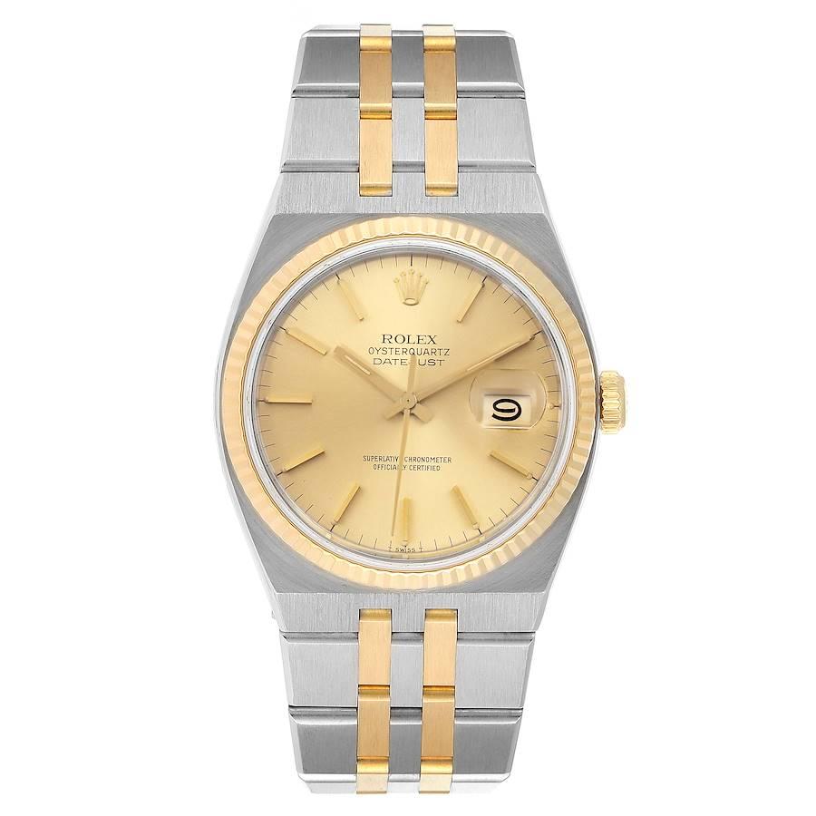 Rolex Oysterquartz Datejust 36mm Steel Yellow Gold Mens Watch 17013. Quartz movement. Stainless steel oyster case 36 mm in diameter. Rolex logo on a crown. 18k yellow gold fluted bezel. Scratch resistant sapphire crystal with cyclops magnifier.