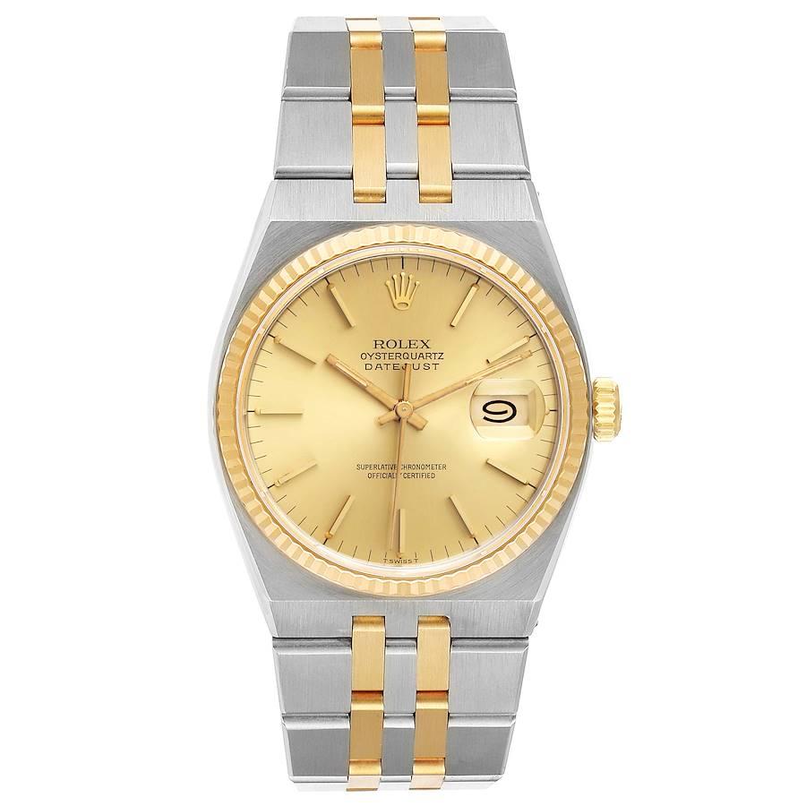 Rolex Oysterquartz Datejust 36mm Steel Yellow Gold Mens Watch 17013. Quartz movement. Stainless steel oyster case 36 mm in diameter. Rolex logo on a crown. 18k yellow gold fluted bezel. Scratch resistant sapphire crystal with cyclops magnifier.