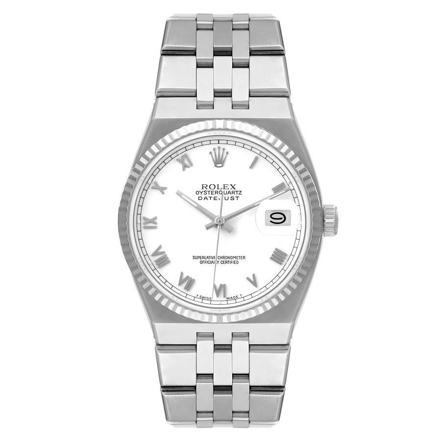 Rolex Oysterquartz Datejust Steel White Gold Fluted Bezel Watch 17014 Box Papers. Quartz movement. Stainless steel oyster case 36.0 mm in diameter. Rolex logo on a crown. 18k white gold fluted bezel. Scratch resistant sapphire crystal with cyclops
