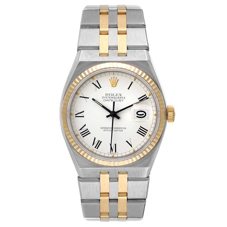 Rolex Oysterquartz Datejust Steel Yellow Gold Buckley Dial Watch 17013. Quartz movement. Stainless steel and 14K yellow gold oyster case 36 mm in diameter. Rolex logo on a crown. 14k yellow gold fluted bezel. Scratch resistant sapphire crystal with