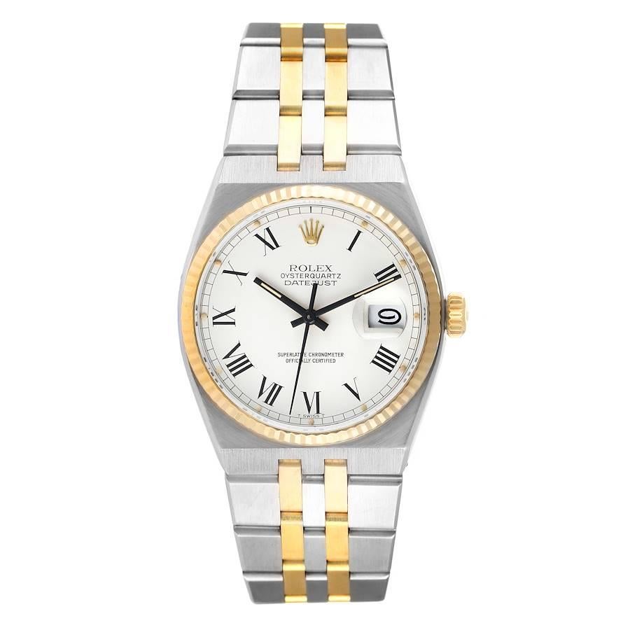 Rolex Oysterquartz Datejust Steel Yellow Gold Buckley Dial Watch 17013. Quartz movement. Stainless steel and 14k yellow gold oyster case 36 mm in diameter. Rolex logo on a crown. 14k yellow gold fluted bezel. Scratch resistant sapphire crystal with