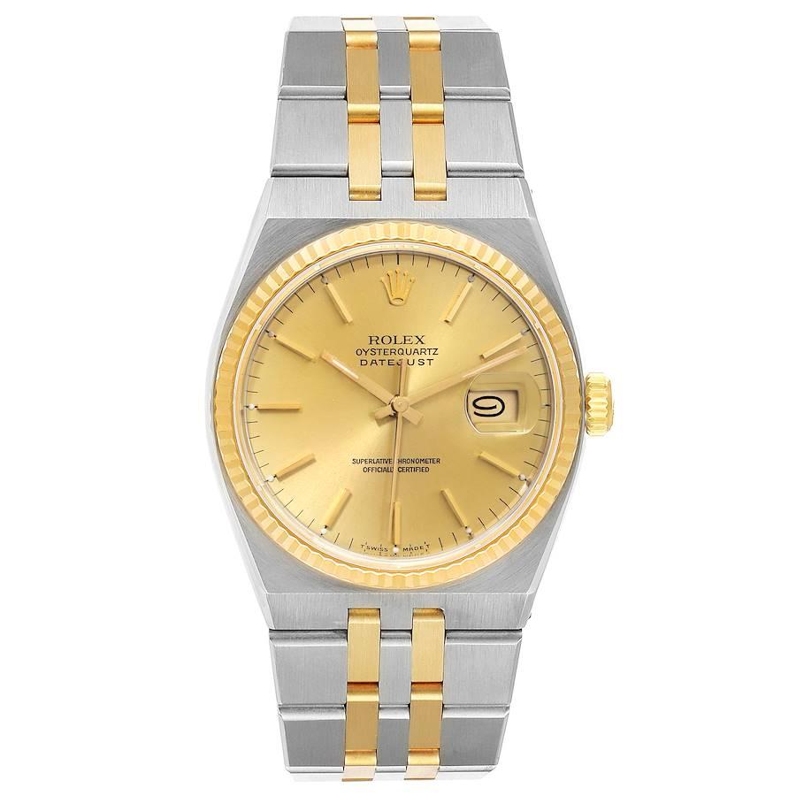 Rolex Oysterquartz Datejust Steel Yellow Gold Mens Watch 17013. Quartz movement. Stainless steel oyster case 36 mm in diameter. Rolex logo on a crown. 18k yellow gold fluted bezel. Scratch resistant sapphire crystal with cyclops magnifier. Champagne