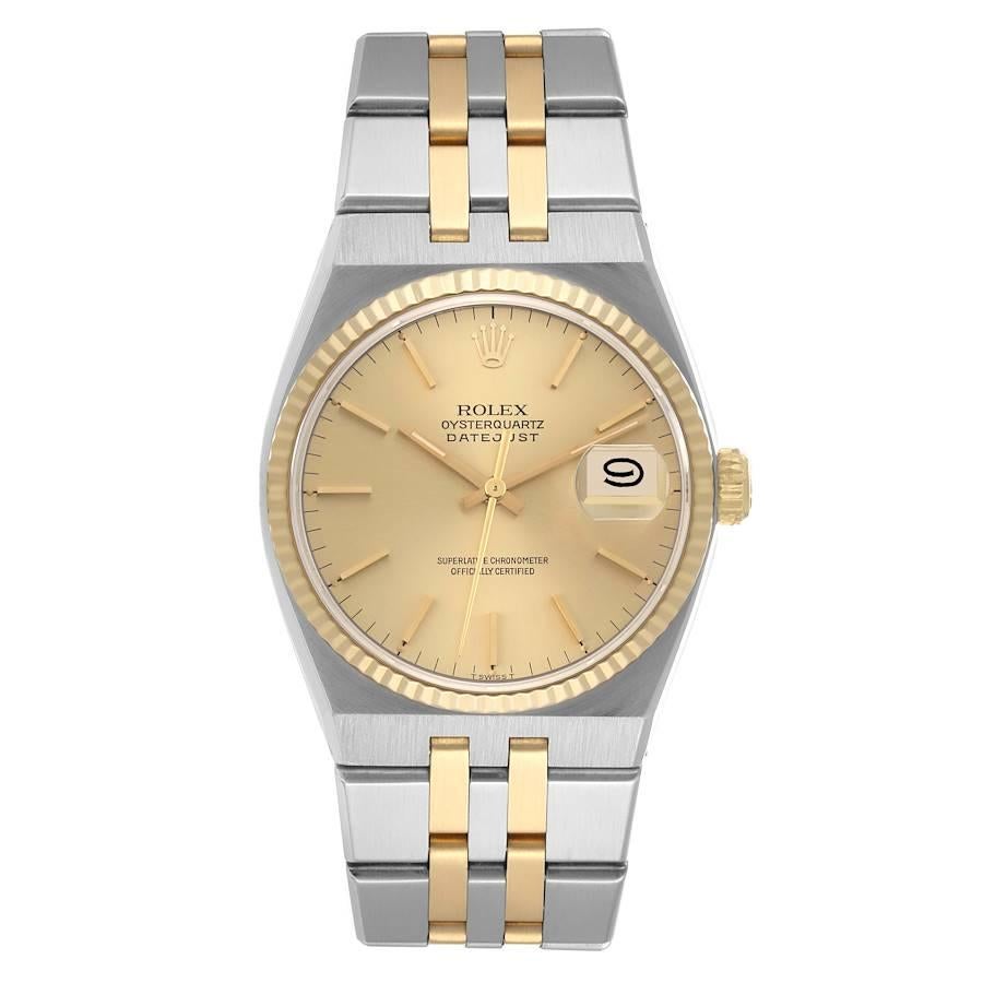 Rolex Oysterquartz Datejust Steel Yellow Gold Mens Watch 17013. Quartz movement. Stainless steel oyster case 36 mm in diameter. Rolex logo on the crown. 14k yellow gold fluted bezel. Scratch resistant sapphire crystal with cyclops magnifier.