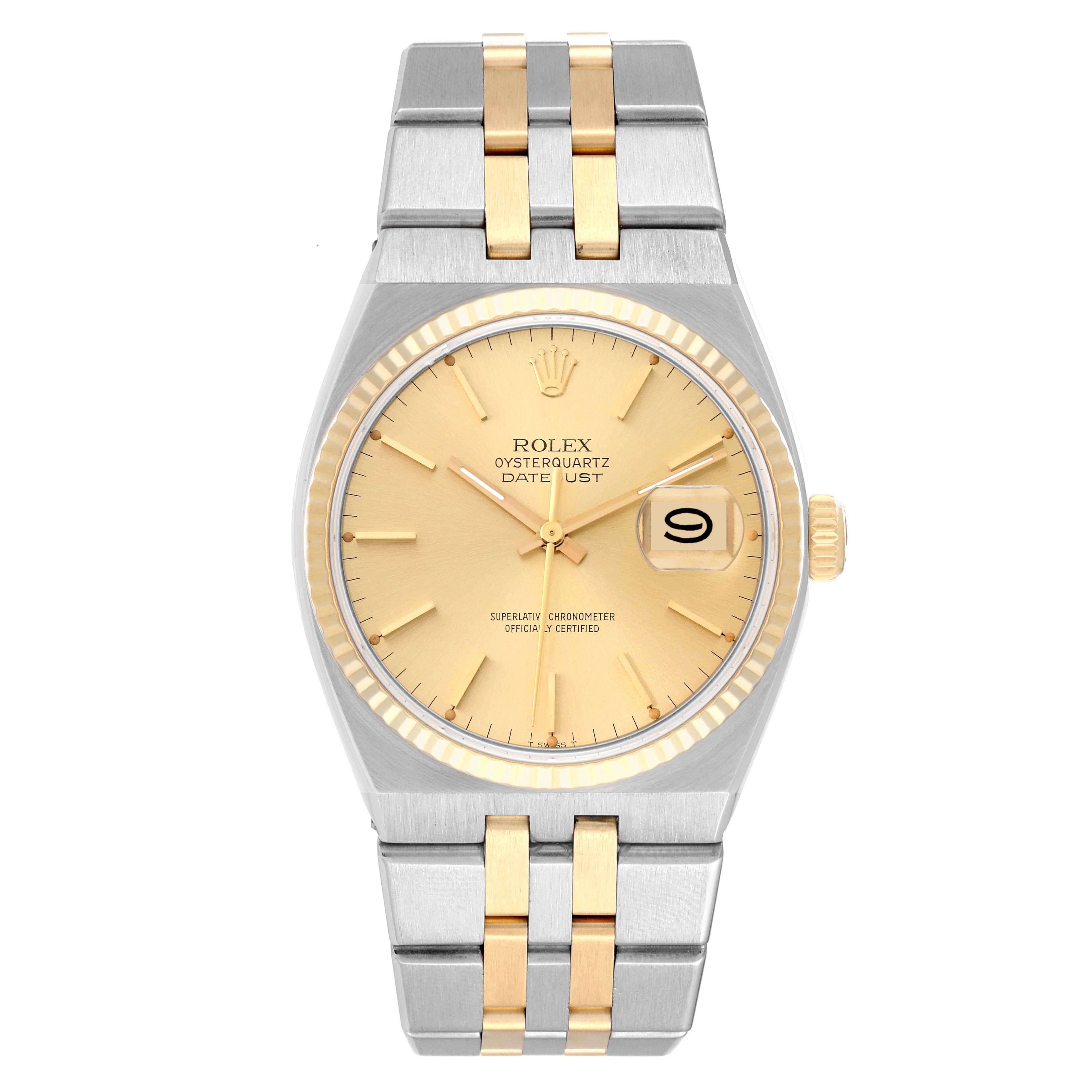 Rolex Oysterquartz Datejust Steel Yellow Gold Mens Watch 17013. Quartz movement. Stainless steel oyster case 36 mm in diameter. Rolex logo on the crown. 18k yellow gold fluted bezel. Scratch resistant sapphire crystal with cyclops magnifier.