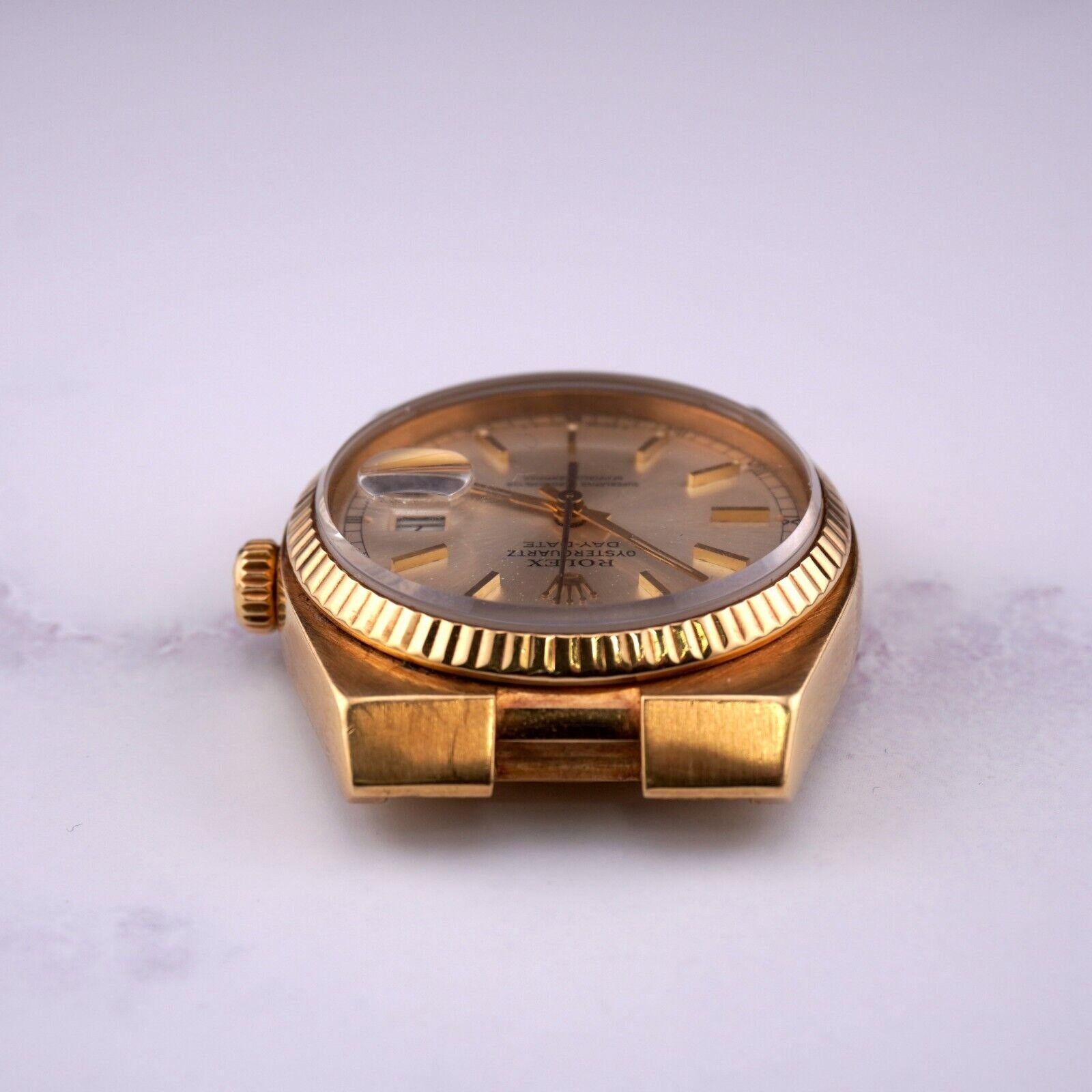 Rolex Oyster Quartz Day-Date 36mm Watch Head

Pre-owned w/ Original Box
100% Authentic Authenticity Card
Condition - (Great Condition) - See Pics
Watch Reference - 19018
Model - Day-Date
Dial Color - Silver
Material - 18k Yellow Gold
