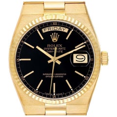 Rolex Oysterquartz President Day-Date Gelbgold Herrenuhr 19018 mit schwarzem Zifferblatt und schwarzem Zifferblatt
