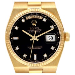 Rolex Montre Oysterquartz President Day-Date en or jaune et diamant 19018