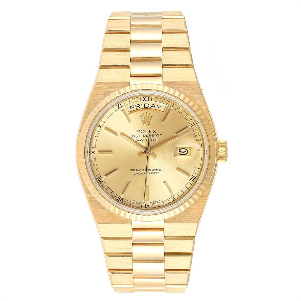 Rolex Oysterquartz President Day-Date Yellow Gold Mens Watch 19018. Quartz movement. 18K yellow gold oyster case 36.0 mm in diameter. Rolex logo on a crown. 18k yellow gold fluted bezel. Scratch resistant sapphire crystal with cyclops magnifier.