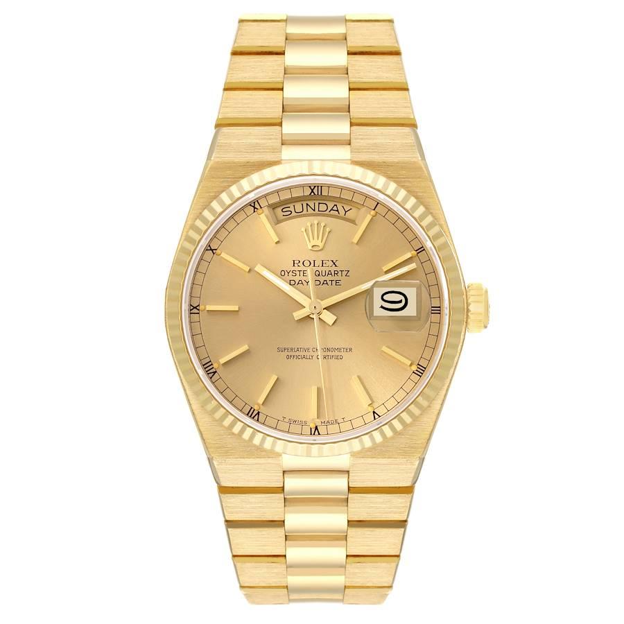 Rolex Oysterquartz President Day-Date Yellow Gold Mens Watch 19018. Quartz movement. 18K yellow gold oyster case 36.0 mm in diameter. Rolex logo on a crown. 18k yellow gold fluted bezel. Scratch resistant sapphire crystal with cyclops magnifier.