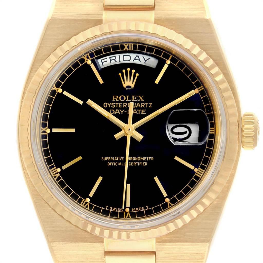Rolex Oysterquartz President Yellow Gold Black Dial Mens Watch 19018. Quartz movement. 18K yellow gold oyster case 36.0 mm in diameter. Rolex logo on a crown. 18k yellow gold fluted bezel. Scratch resistant sapphire crystal with cyclops magnifier.