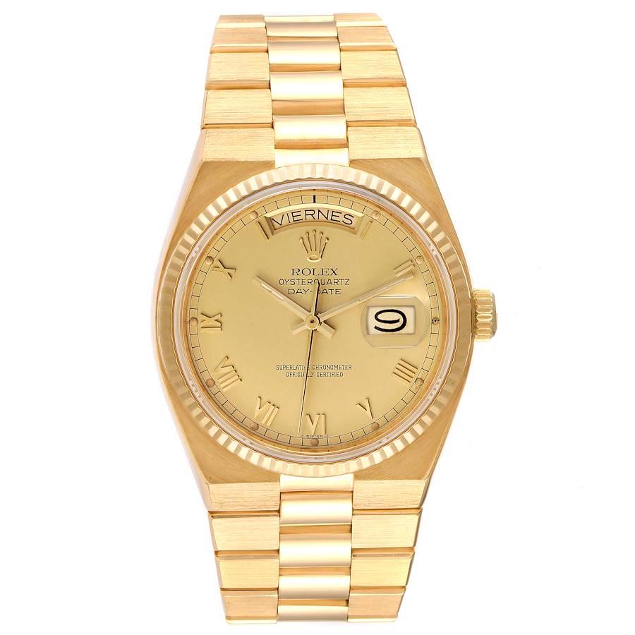 Rolex Oysterquartz President Yellow Gold Champagne Dial Mens Watch 19018. Quartz movement. 18K yellow gold oyster case 36.0 mm in diameter. Rolex logo on a crown. 18k yellow gold fluted bezel. Scratch resistant sapphire crystal with cyclops