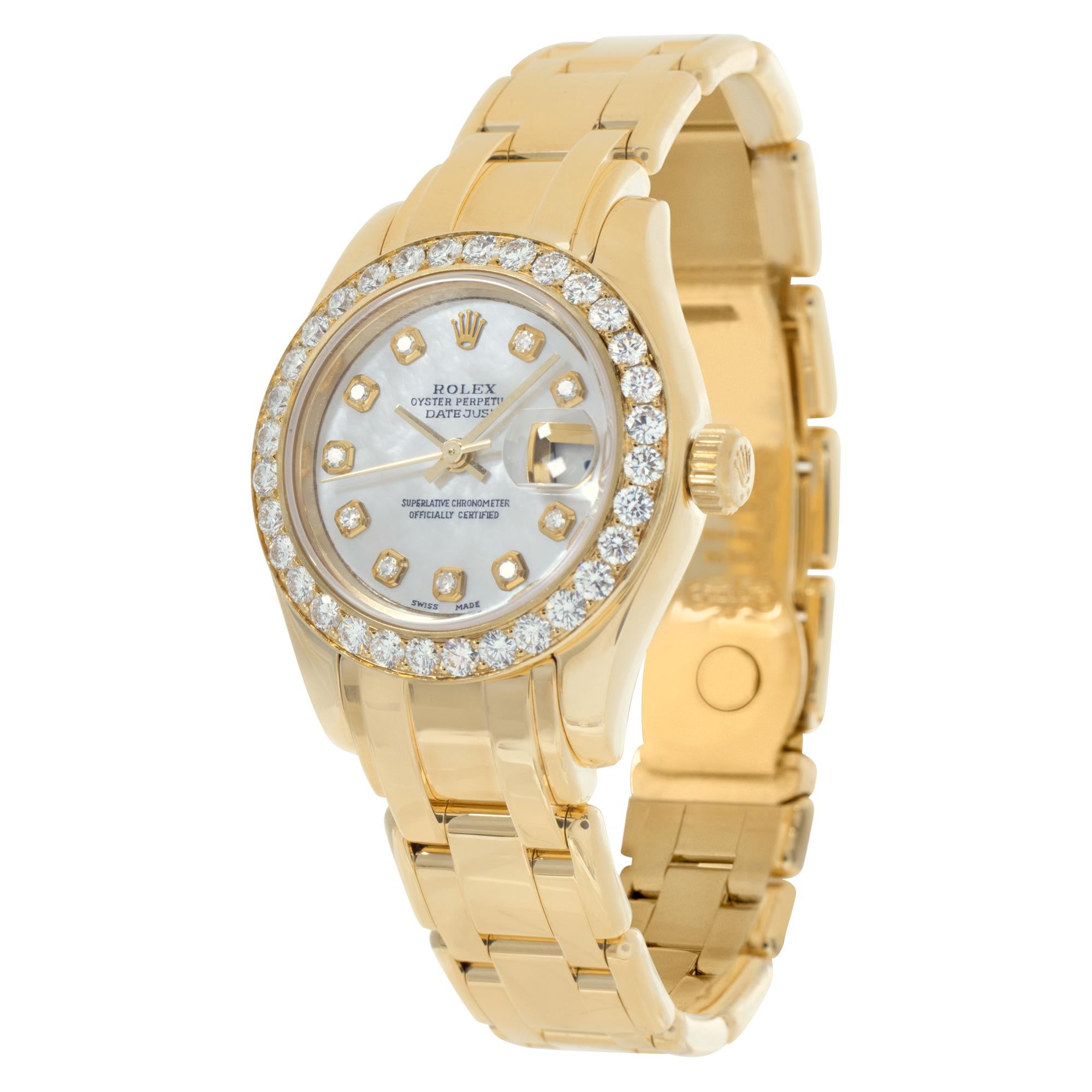 Rolex Pearlmaster with factory mother of pearl diamond dial & diamond bezel in 18k yellow gold. Auto w/ sweep seconds and date. 29 mm case size. With papers. **Bank wire only at this price** Ref 80318. Circa 2005. Fine Pre-owned Rolex