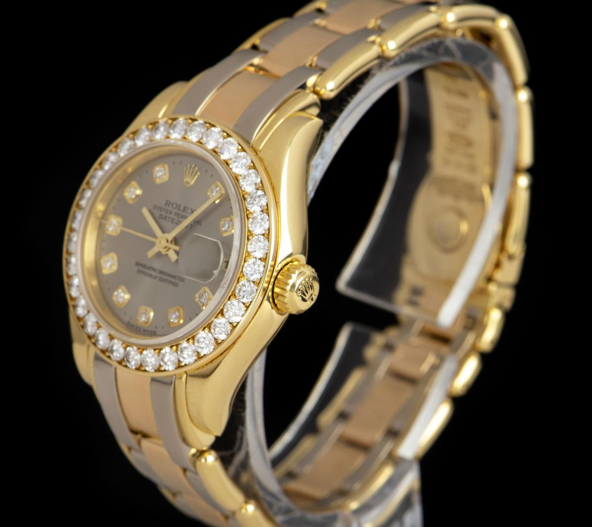 An 18k Yellow Gold Oyster Perpetual Pearlmaster Datejust Ladies Wristwatch, silver dial with 10 applied round brilliant cut diamond hour markers, date at 3 0'clock, a fixed 18k yellow gold bezel set with approximately 32 round brilliant diamonds, an