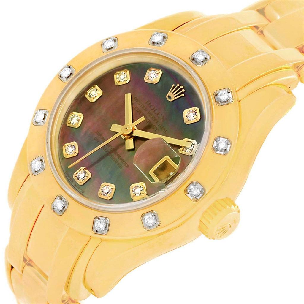 Rolex Pearlmaster Yellow Gold Black MOP Diamond Ladies Watch 69318. Officially certified chronometer automatic self-winding movement. 18k yellow gold oyster case 29 mm in diameter. Rolex logo on a crown. Original Rolex factory diamond bezel. Scratch