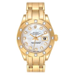 Montre Rolex Pearlmaster en or jaune, nacre et diamants, pour femmes, 69318 boîte