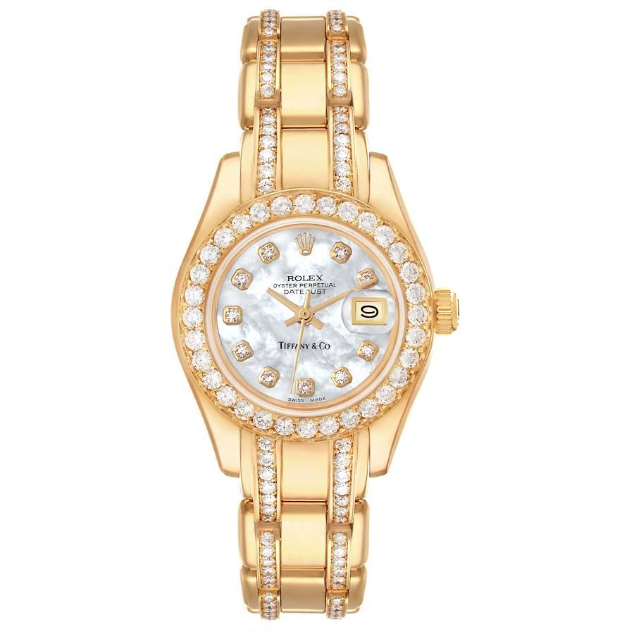 Rolex Pearlmaster Yellow Gold Tiffany Mother Of Pearl Diamond Ladies Watch 69298 Box Papers. Officially certified chronometer self-winding movement. 18k yellow gold oyster case 29.0 mm in diameter. Rolex logo on a crown. Original Rolex factory