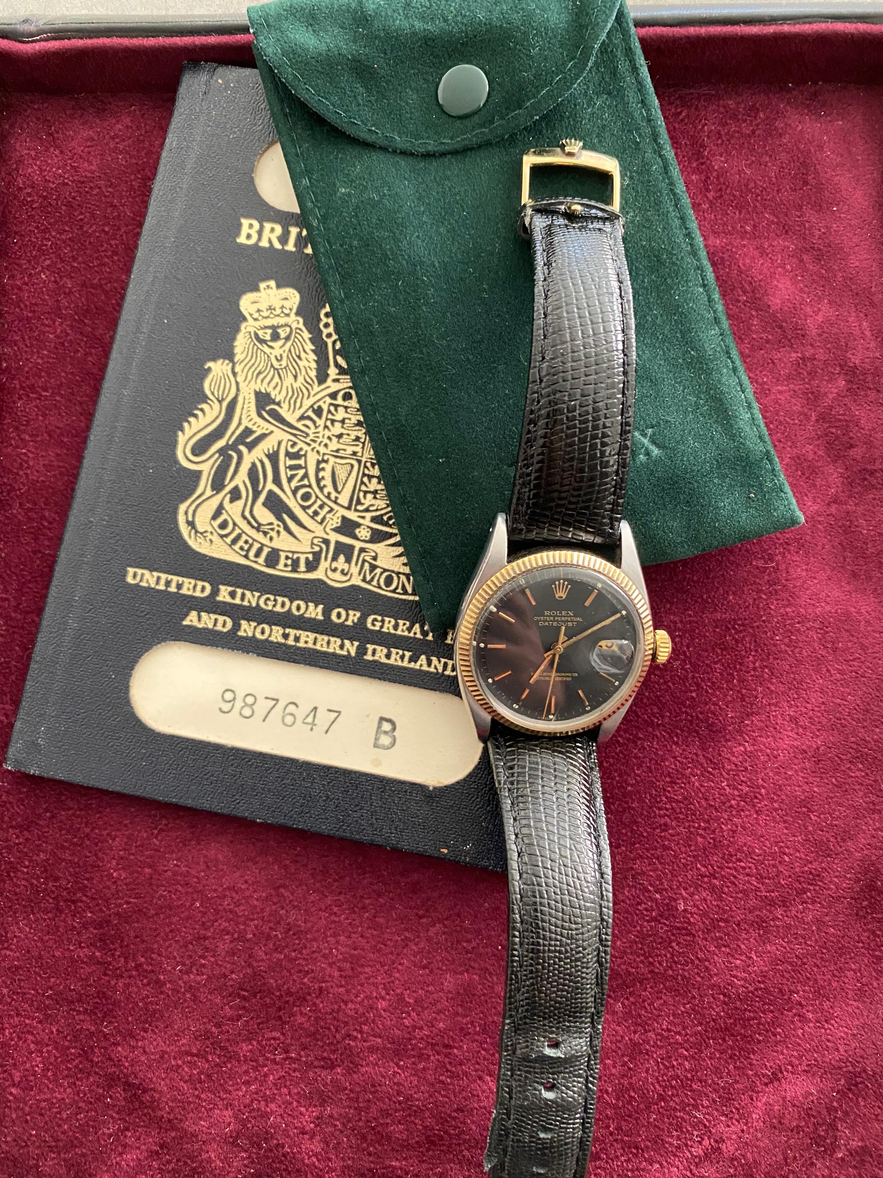 Rolex Oyster Datejust SS Automatic 1970s Vintage
Black face, gold crown and bezel. 

Condition Excellent
Repaired: Cleaned and serviced, dial restored to exact specification. Replacements made.
New aftermarket black leather strap, with Rolex buckle.