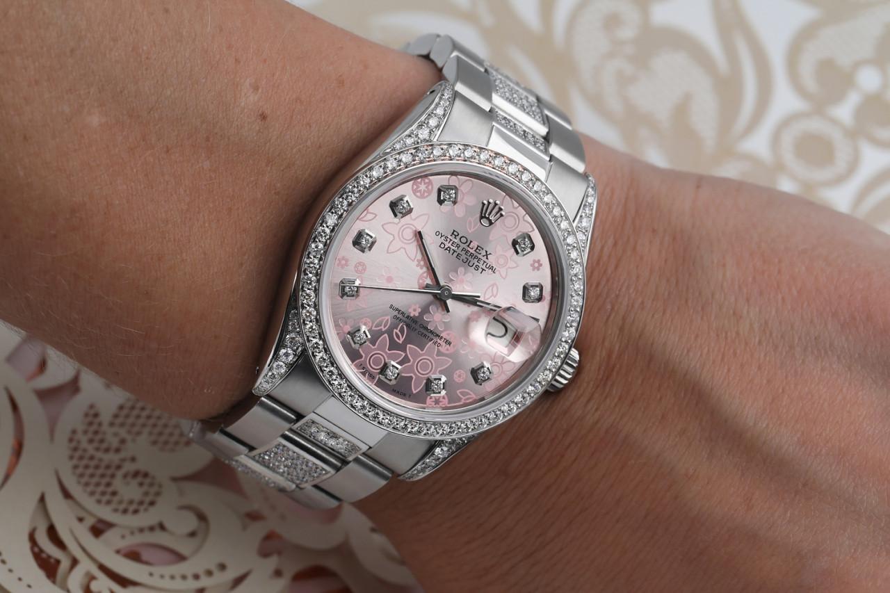 Rolex Pink Flower 36mm Datejust S/S Oyster Perpetual Diamond On Side Band + Bezel & Lugs 16014.

This watch is in like new condition. It has been polished, serviced and has no visible scratches or blemishes. All our watches come with a standard 1