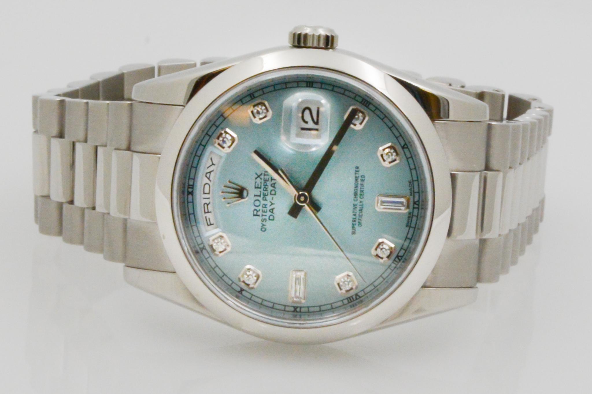 Rolex CPO Platinum Day Date
Model: Platinum Day Date #M118206
Movement: Automatic
Case Size: 36mm
Dial: Ice Blue Diamond
Circa 2001, box & papers