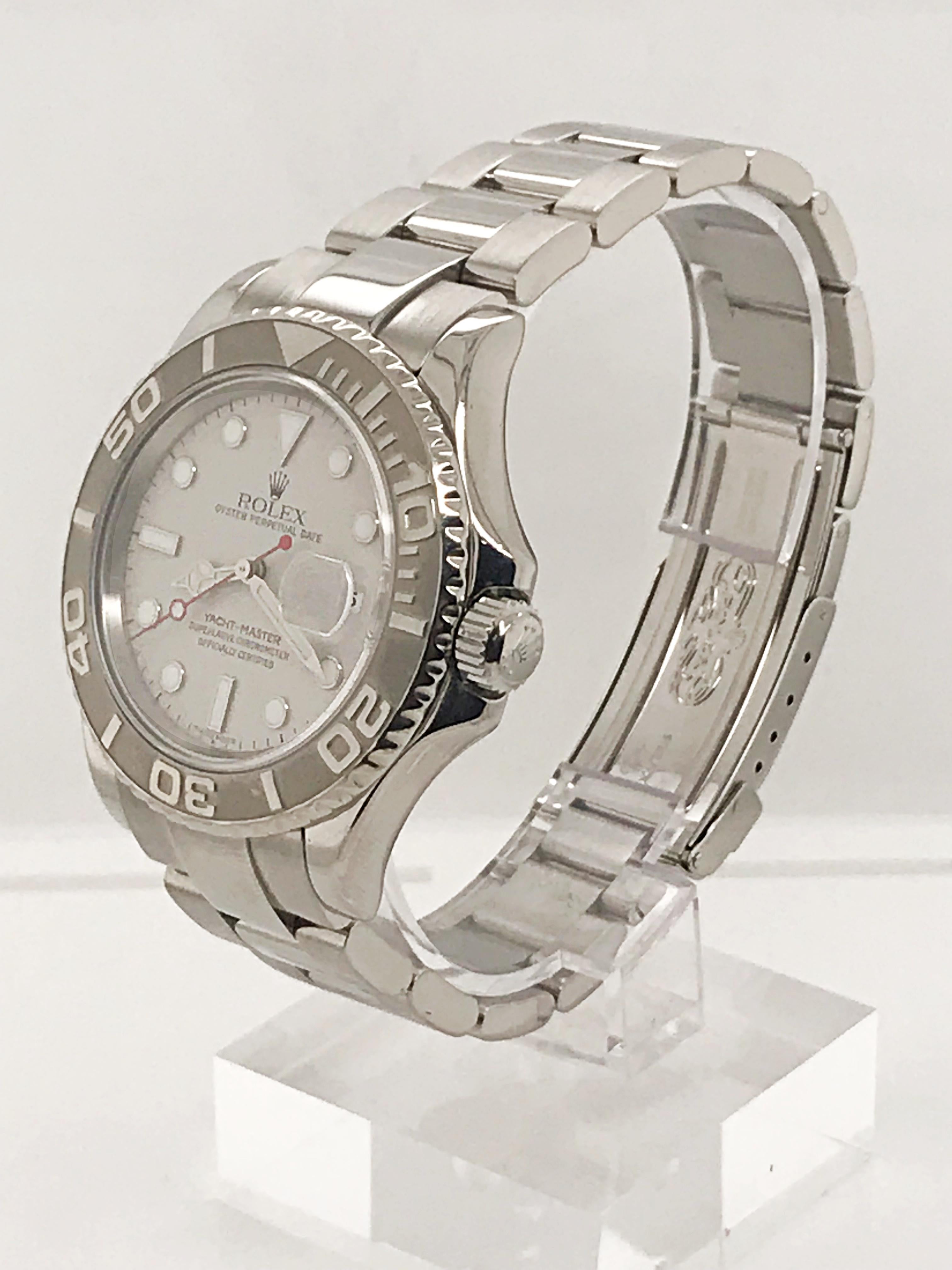 This beautiful 2004 Yachtmaster by Rolex features a Stainless Steel bracelet and rotating Platinum bezel. The bracelet is a Rolex Oysterlink with Oysterlock clasp.

Serial Number - FXXXXXX 
Model Number - 16622

This timepiece was recently serviced