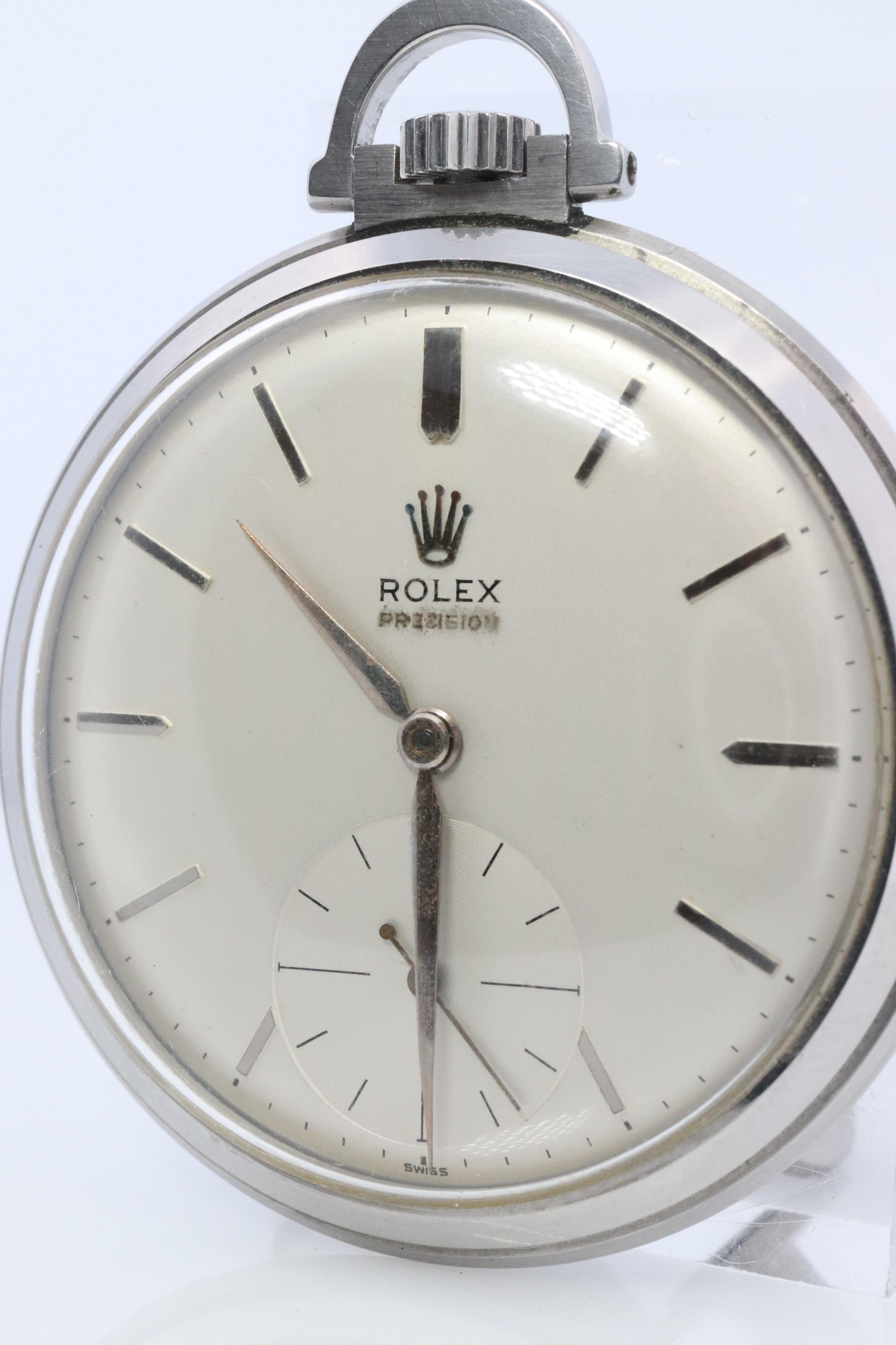 Vintage Rolex Pocket Watch.

Precision Ref: 9165

Circa 1952


Please refer to pictures to see the movement.

Condition: Winds up and ticks. Second hand moves smoothly.

Details:
45.5mm by 10.5mm stainless steel case
6mm crown


Please don't