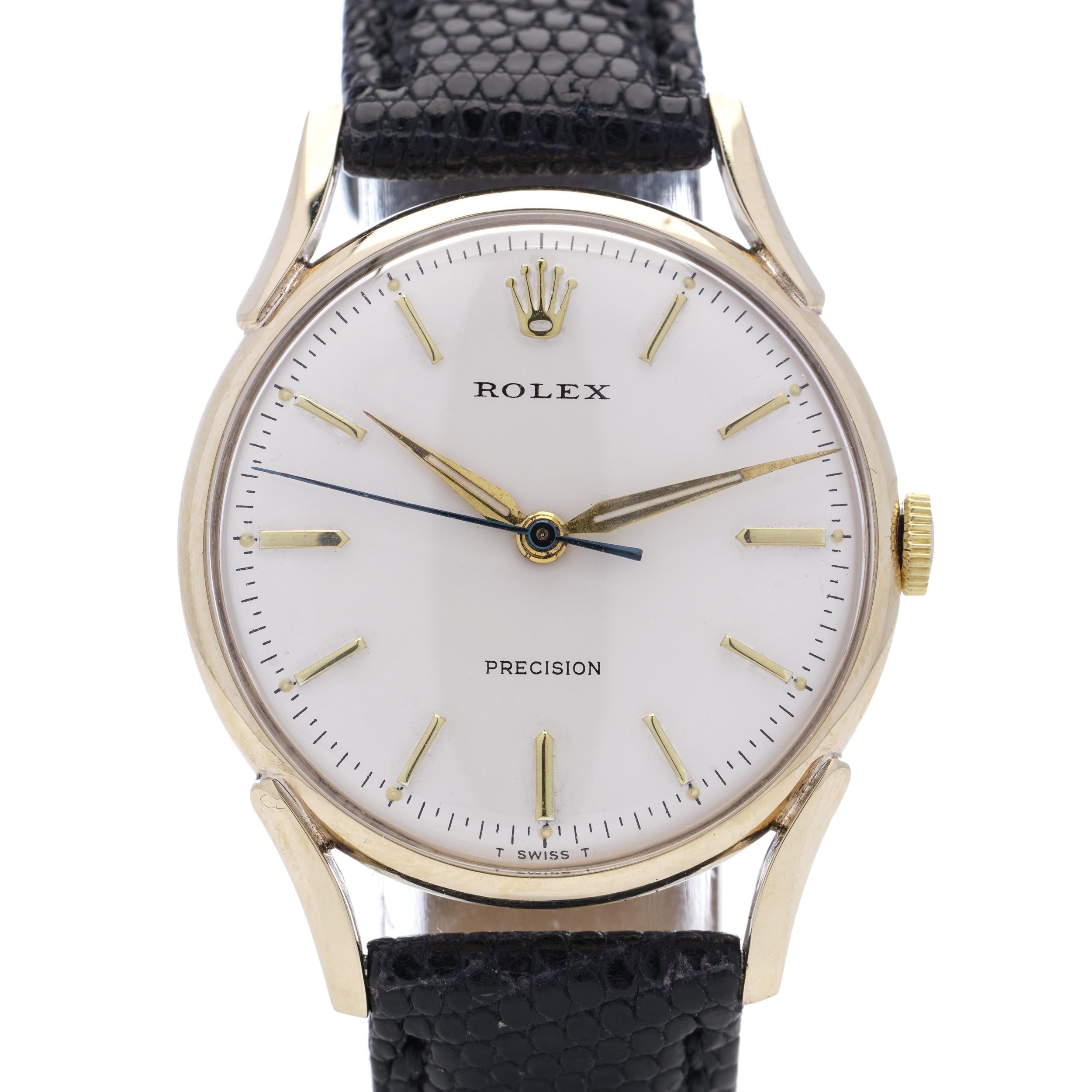 Rolex Precision 9kt. yellow gold men's wristwatch with white dial, 1957
Made Switzerland.
Reference Nr.12857

The watch is fully Inspected, Serviced & Guaranteed.
High Grade Rolex Cal.1210, 17 Jewels

Case Diameter: 31 mm
Dial: Signed