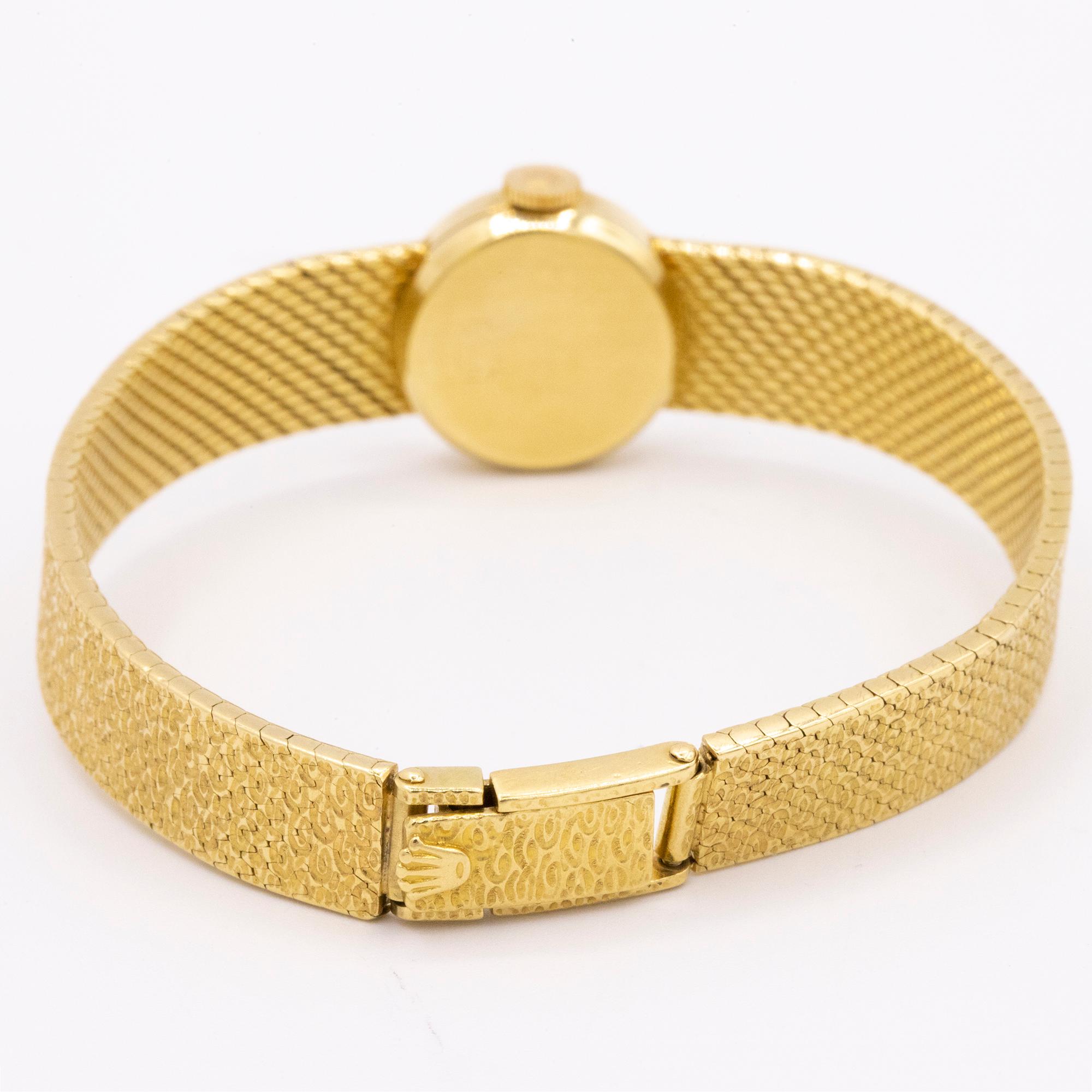 Brand: Rolex
Model: Precision
Reference: n/a
Year: 1940s
Material: 18kt Yellow Gold
Size: Less than 26mm
Crystal: Top Hat style Acrylic 
Bracelet: 18kt Yellow Gold texture pressed links