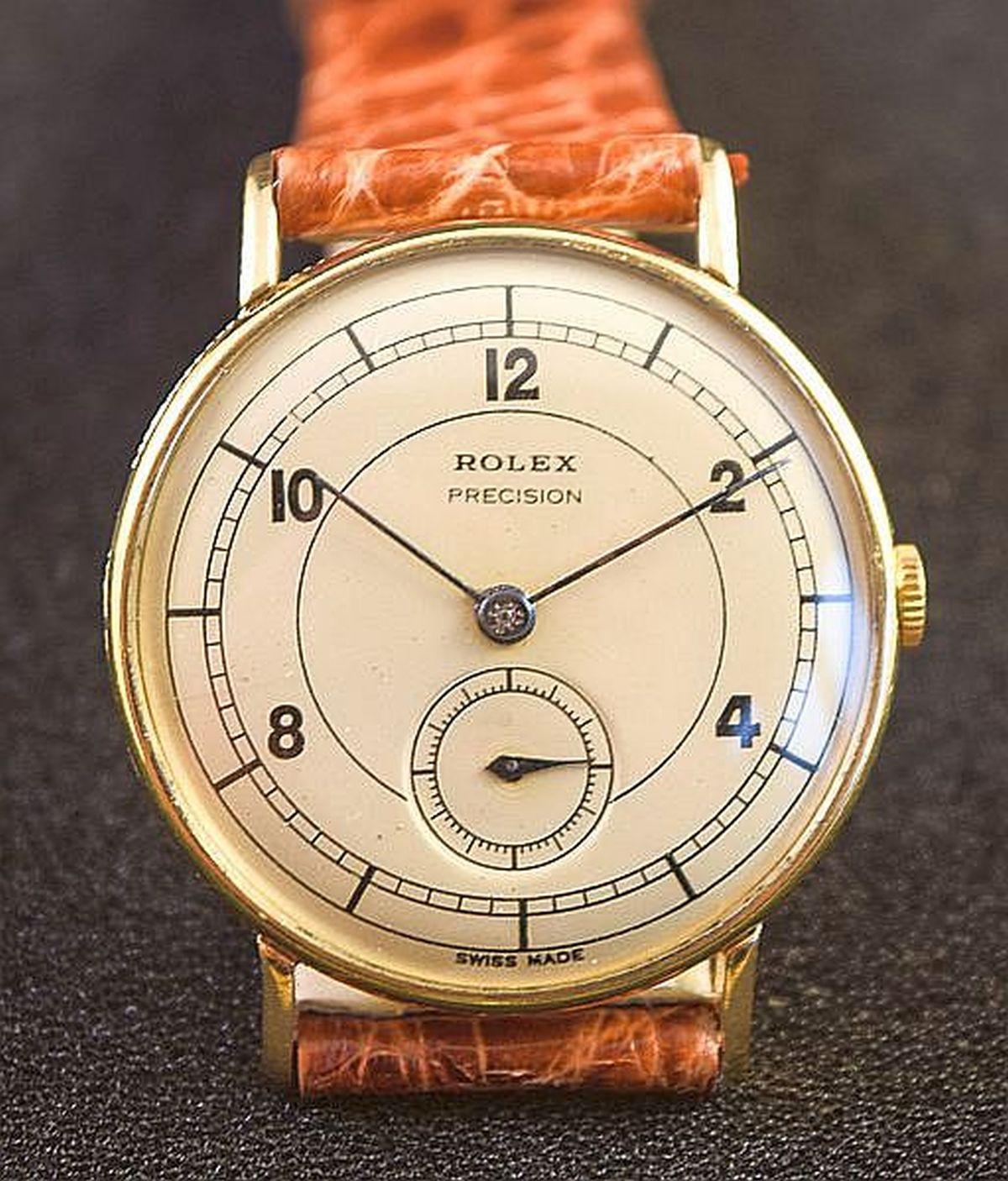 ROLEX PRECISION REF 1923 RARE COIN EDGE VINTAGE
 Extremely rare Vintage Rolex. Collectors dream watch .
1950's Manual winding mechanical watch
Case has coin edges that are sharp and in good condition. 
Watch is larger than usual and was considered