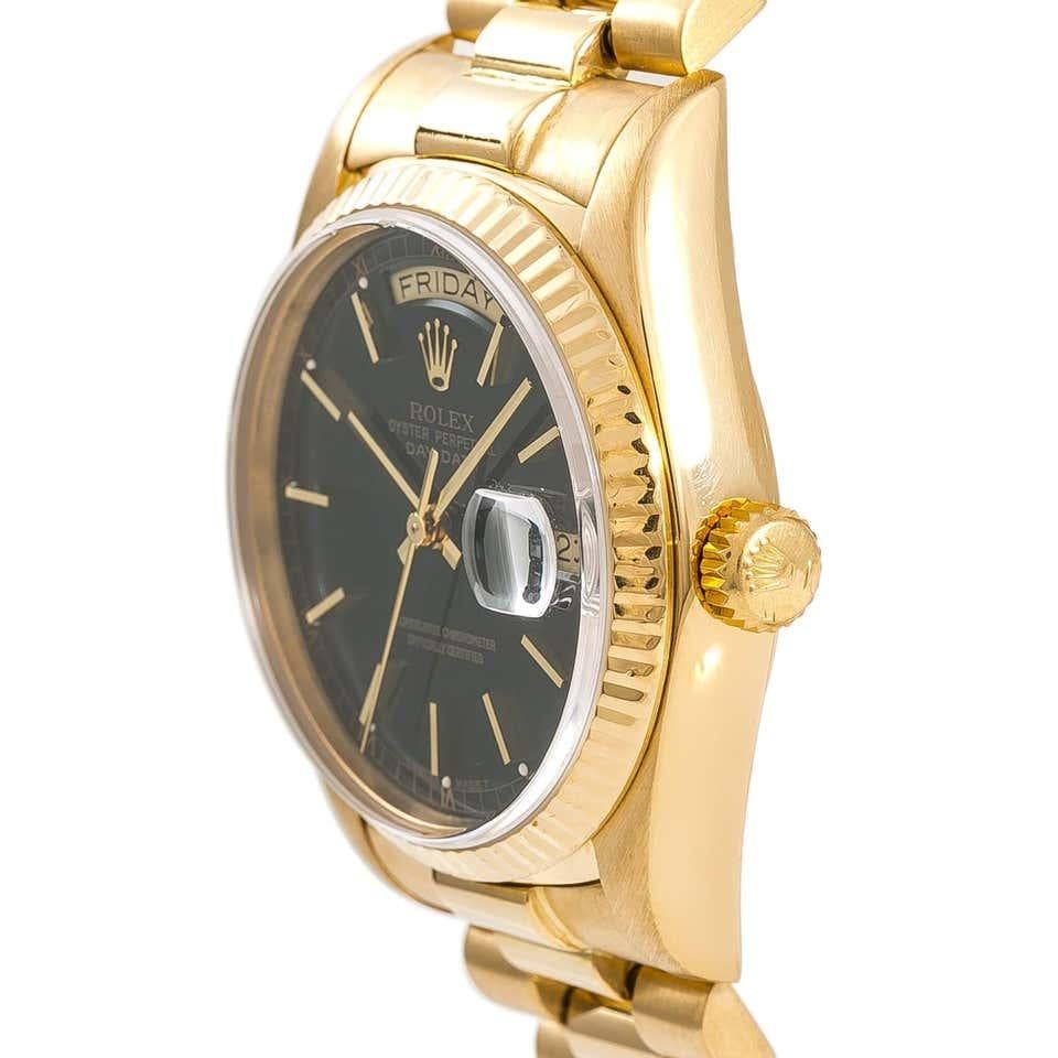 Brand - Rolex
Model - 18038 President(day-date) 
Case Size - 36mm 
Metals - Yellow Gold 
Bezel - Yellow Gold Fluted
Crystal - Sapphire
Dial - Black Stick track 
Movement - Rolex CAL.3135
Wrist Band - President jubilee 
Wrist Size - 7 1/2 inches 
