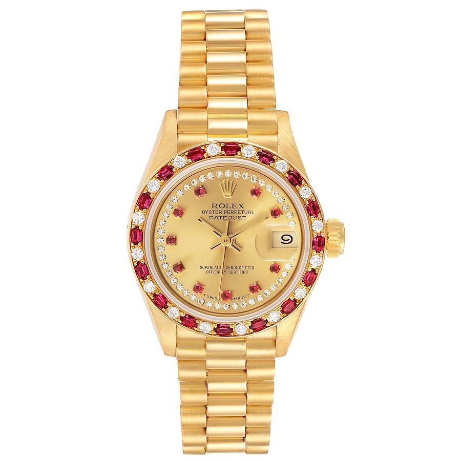 Rolex President 18k Yellow Gold Diamond Ruby Ladies Watch 69188 Box Papers. Officially certified chronometer self-winding movement. 18k yellow gold oyster case 26.0 mm in diameter. Rolex logo on a crown. 18k yellow gold diamond rubies bezel. Scratch