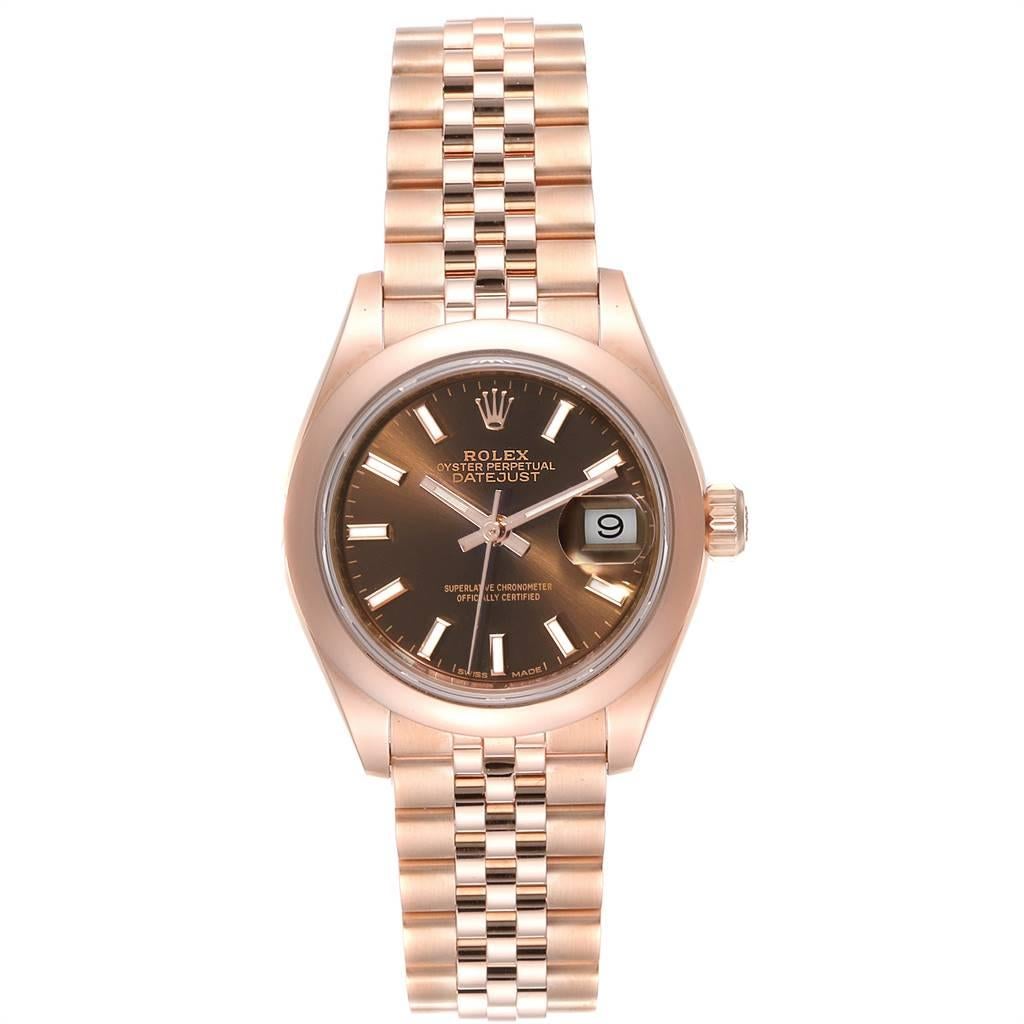 Rolex President 28 Rose Gold Chocolate Dial Ladies Watch 279165 Box Card. Officially certified chronometer self-winding movement. 18k rose gold oyster case 28.0 mm in diameter. Rolex logo on a crown. 18k rose gold smooth domed bezel. Scratch