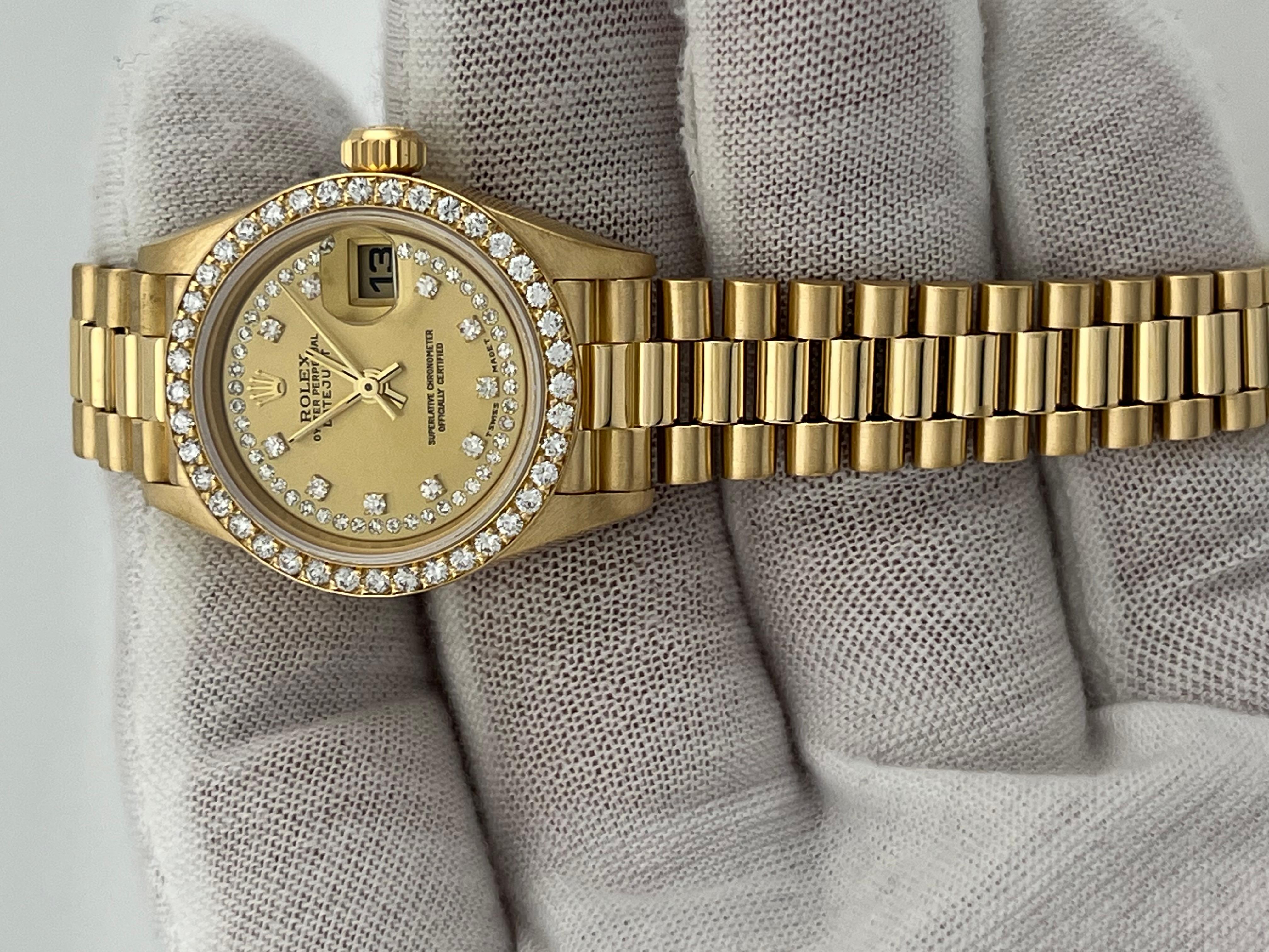 Style Number: 69138



Serial: 9058***



Year: 1987

 

Model: Rolex Ladies President Datejust 

 

Case Material: 18K Yellow Gold 

 

Band: 18K Yellow Gold 

 

Bezel: Factory Original Diamond Bezel 

 

Dial: Factory Original String Diamond Dial