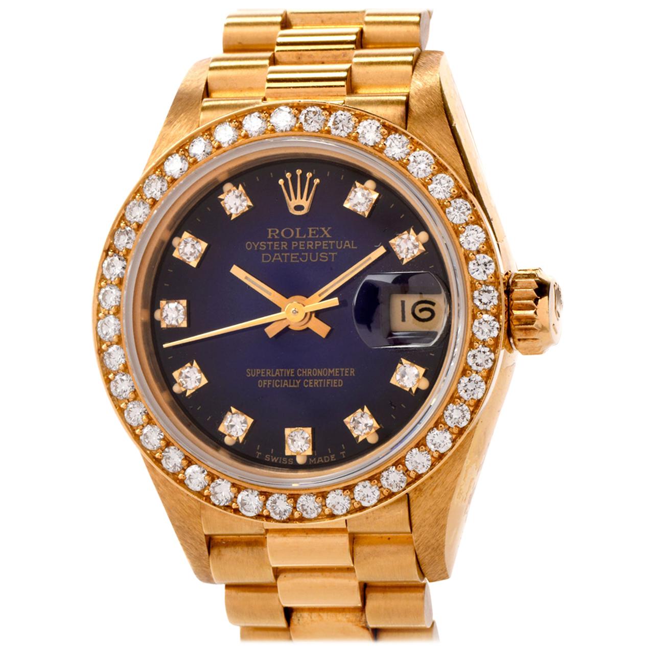 Ladies Rolex  28 mm ref 69138 

Ant condition 18k yellow gold case Rare Rolex Blue Dial with Factory set Diamond bezel with diamond dial with luminous hands. 

 Date display at 3 o'clock position, quickset date function. 

Sapphire crystal glass,