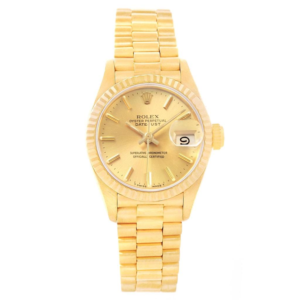 Rolex President Datejust 18K Yellow Gold 26mm Ladies Watch 69178. Officially certified chronometer self-winding movement. 18k yellow gold oyster case 26.0 mm in diameter. Rolex logo on a crown. 18k yellow gold fluted bezel. Scratch resistant