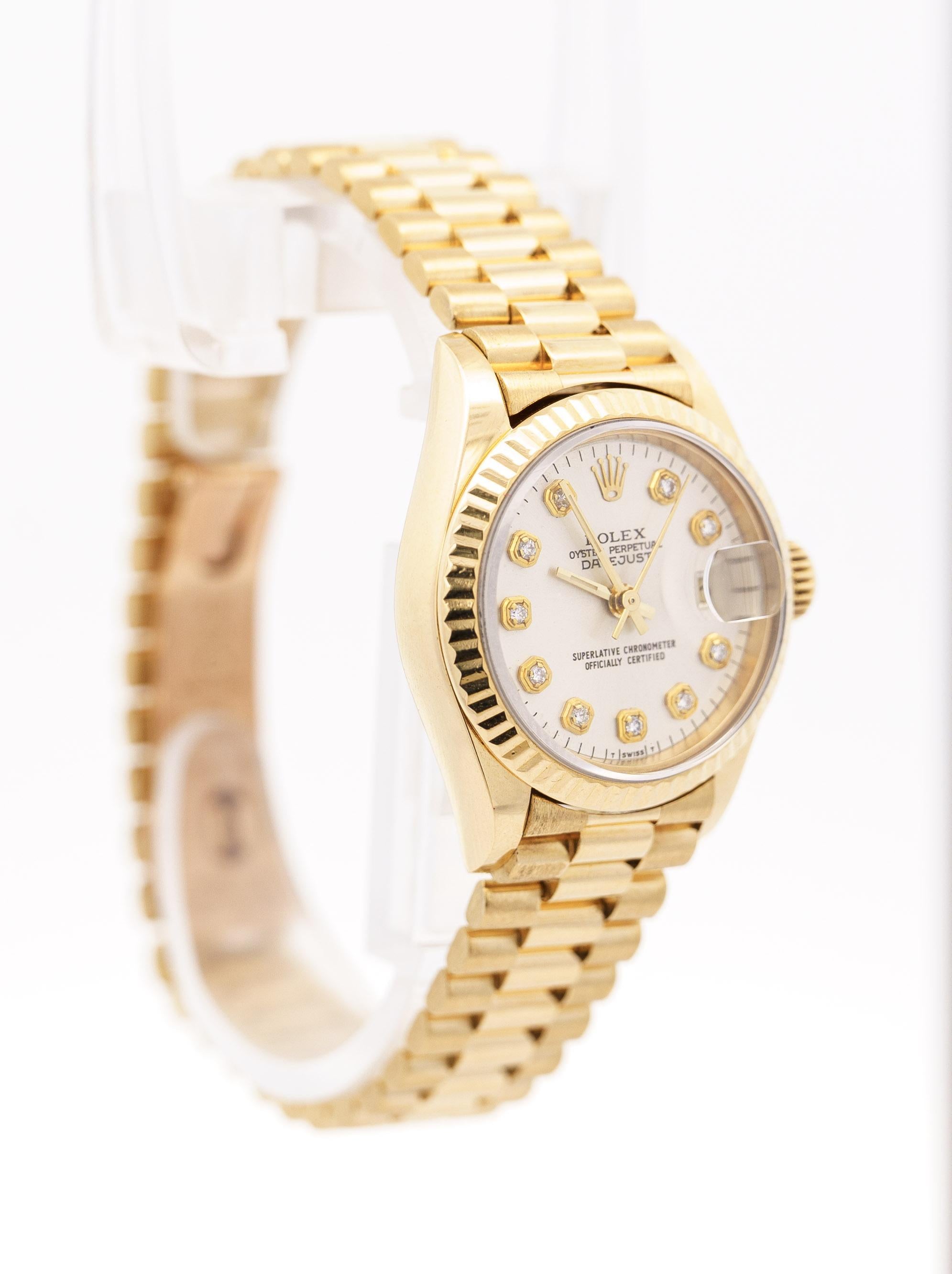 Vintage Rolex President Datejust 18k gold ladies wrist watch. Reference 79178. 26mm case diamond hour marker dial, fluted bezel, automatic self winding movement with presidential bracelet and hidden fold over clasp. Complete with Rolex box, papers,