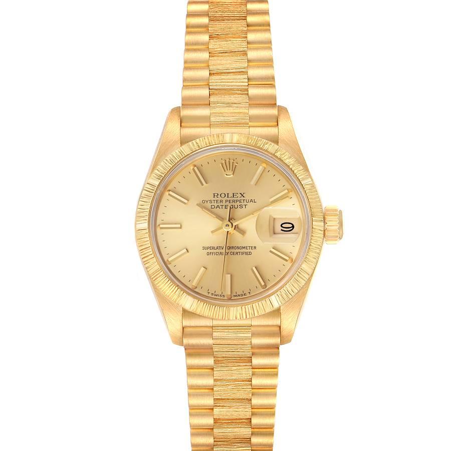 Rolex President Datejust 18K Yellow Gold Bark Finish Ladies Watch 69278. Officially certified chronometer self-winding movement. 18k yellow gold oyster case 26.0 mm in diameter. Rolex logo on a crown. 18k yellow gold engine turned bezel. Scratch