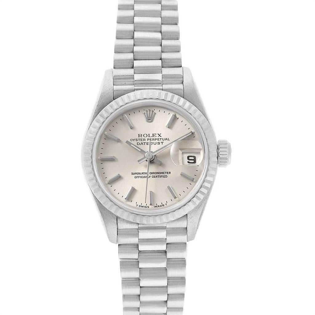 Rolex President Datejust 26 White Gold Silver Dial Ladies Watch 69179. Officially certified chronometer self-winding movement. 18k white gold oyster case 26.0 mm in diameter. Rolex logo on a crown. 18K white gold fluted bezel. Scratch resistant
