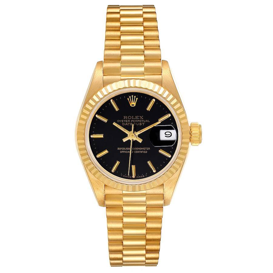 Rolex President Datejust 26 Yellow Gold Black Dial Ladies Watch 69178. Officially certified chronometer self-winding movement. 18k yellow gold oyster case 26.0 mm in diameter. Rolex logo on a crown. 18k yellow gold fluted bezel. Scratch resistant