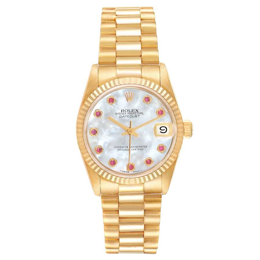 Rolex President Datejust 31 Midsize Yellow Gold MOP Ruby Ladies Watch 68278. Officially certified chronometer self-winding movement. 18k yellow gold oyster case 31.0 mm in diameter. Rolex logo on a crown. 18k yellow gold fluted bezel. Scratch