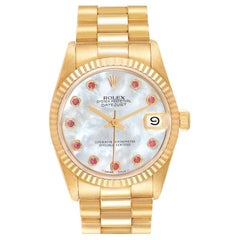 Rolex President Datejust 31 Midsize Gelbgold MOP Rubin Damenuhr 68278