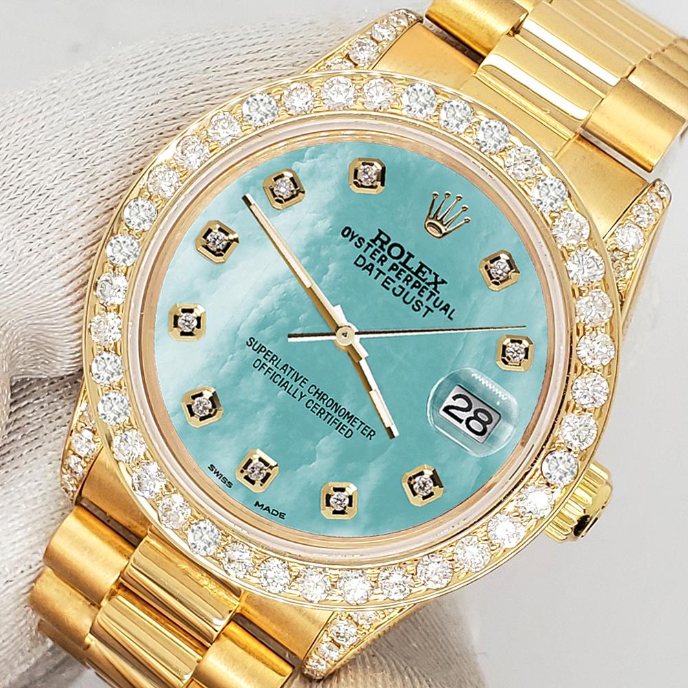 Rolex President Datejust 31mm Yellow Gold Watch. Rolex self-winding automatic movement. Custom 2.3ct diamond bezel/Lugs/diamond numerals dial (diamonds are not set by Rolex). 

Excellent, pristine condition, no signs of wear, works flawlessly, comes