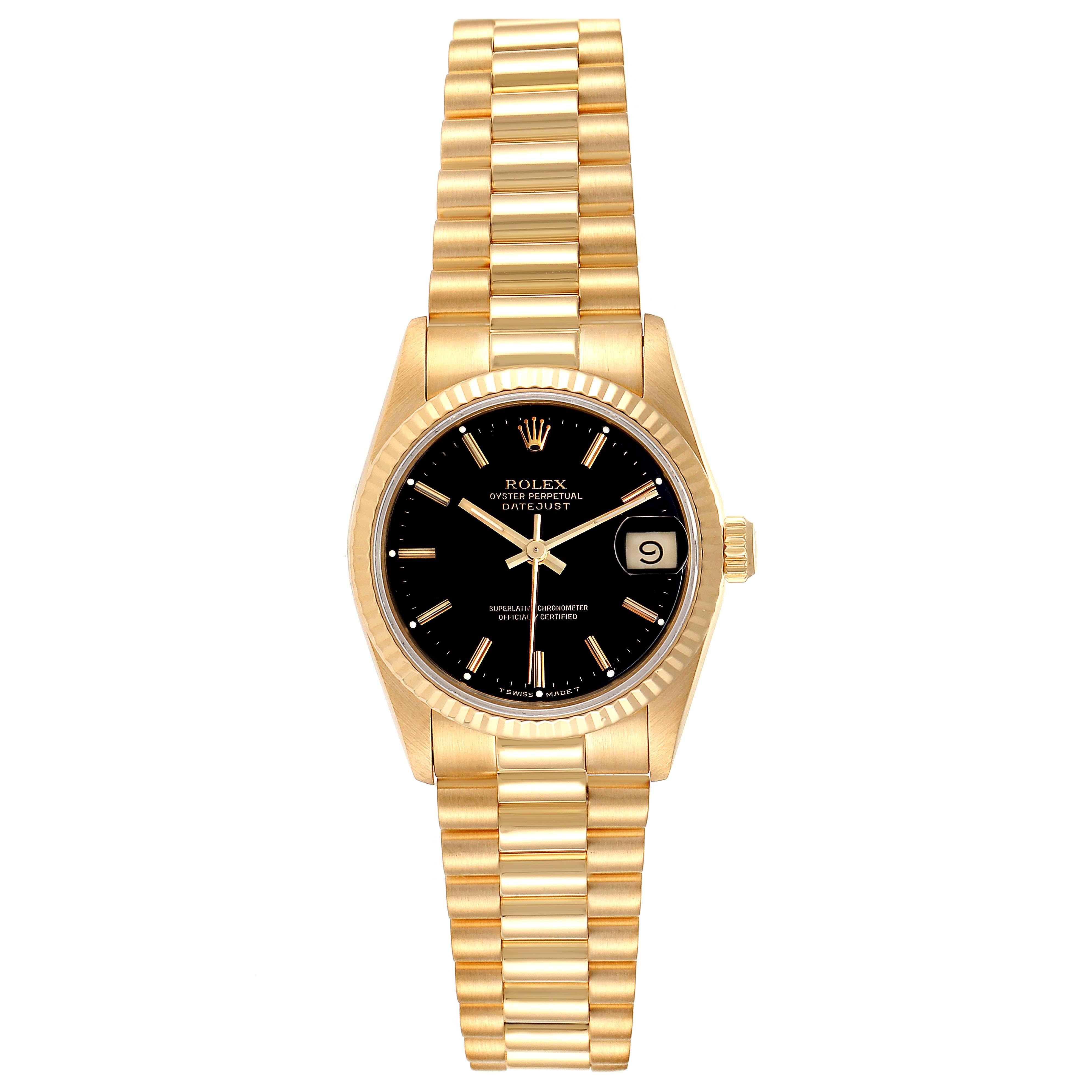 Rolex President Datejust Midsize Black Dial Yellow Gold Ladies Watch 68278. Officially certified chronometer self-winding movement. 18k yellow gold oyster case 31.0 mm in diameter. Rolex logo on a crown. 18k yellow gold fluted bezel. Scratch