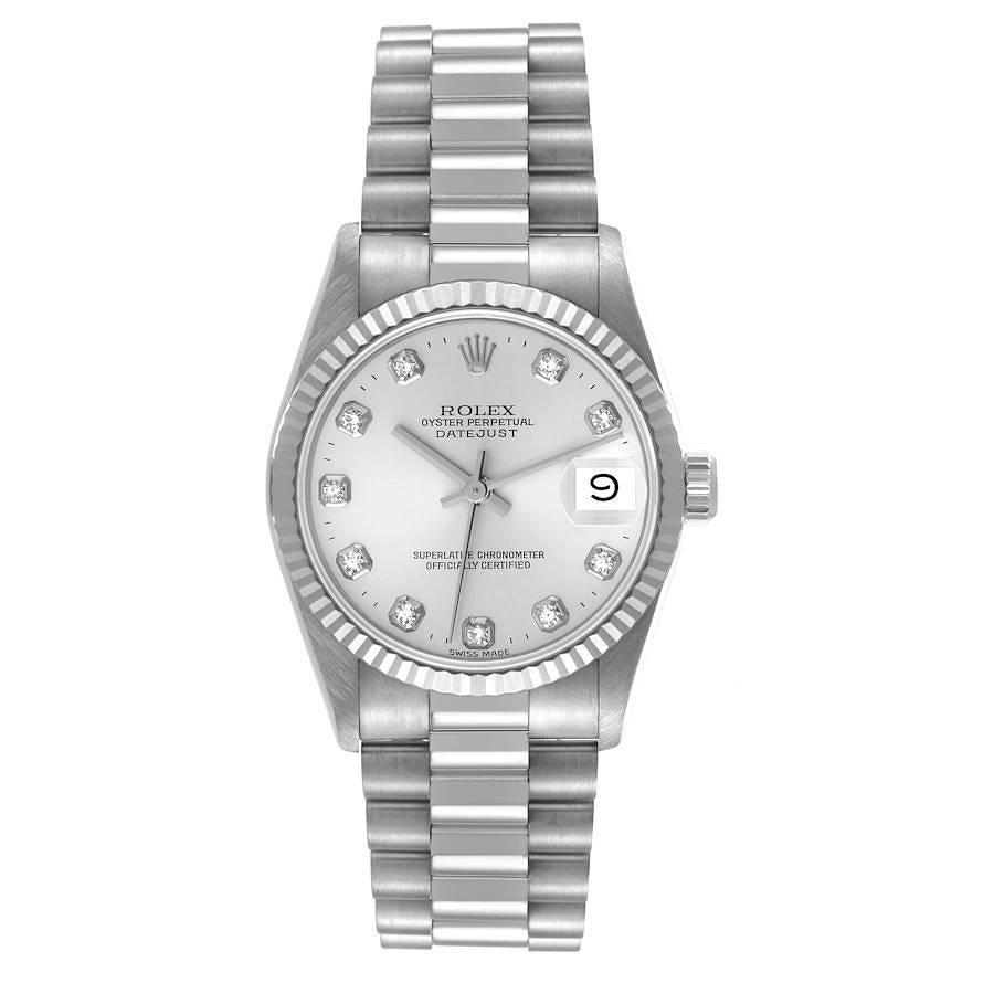 Rolex President Datejust Midsize White Gold Diamond Ladies Watch 68279. Officially certified chronometer self-winding movement. 18k white gold oyster case 31.0 mm in diameter. Rolex logo on a crown. 18k white gold fluted bezel. Scratch resistant