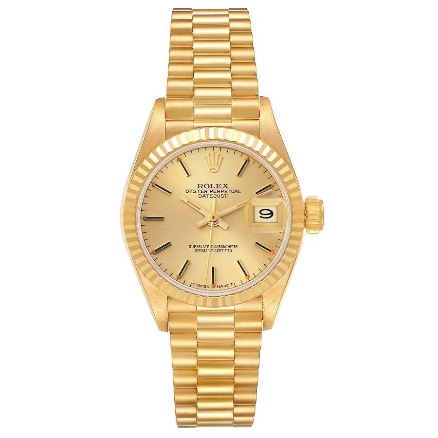 Rolex President Datejust Yellow Gold Champagne Dial Ladies Watch 69178. Officially certified chronometer self-winding movement. 18k yellow gold oyster case 26.0 mm in diameter. Rolex logo on the crown. 18k yellow gold fluted bezel. Scratch resistant