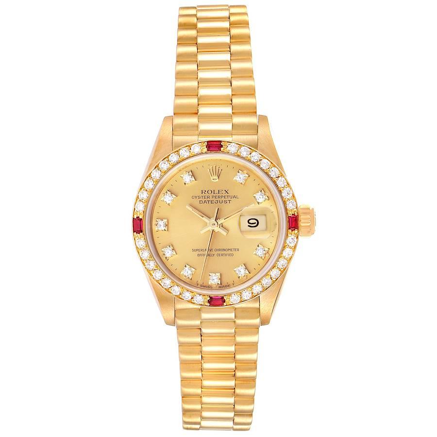 Rolex President Datejust Yellow Gold Diamond Ruby Ladies Watch 69068. Officially certified chronometer self-winding movement. 18k yellow gold oyster case 26.0 mm in diameter. Rolex logo on a crown. Original Rolex factory diamond and ruby bezel.