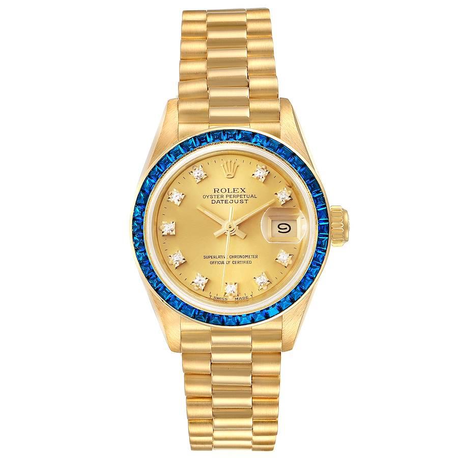 Rolex President Datejust Yellow Gold Diamond Sapphire Ladies Watch 69118. Officially certified chronometer self-winding movement. 18k yellow gold oyster case 26.0 mm in diameter. Rolex logo on a crown. 18k yellow gold original Rolex factory