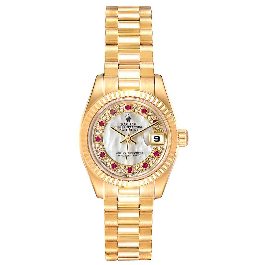 Rolex President Datejust Yellow Gold MOP Myriad Diamond Rubies Watch 179178 Box Papers. Officially certified chronometer self-winding movement. 18k yellow gold oyster case 26.0 mm in diameter. Rolex logo on a crown. 18k yellow gold fluted bezel.